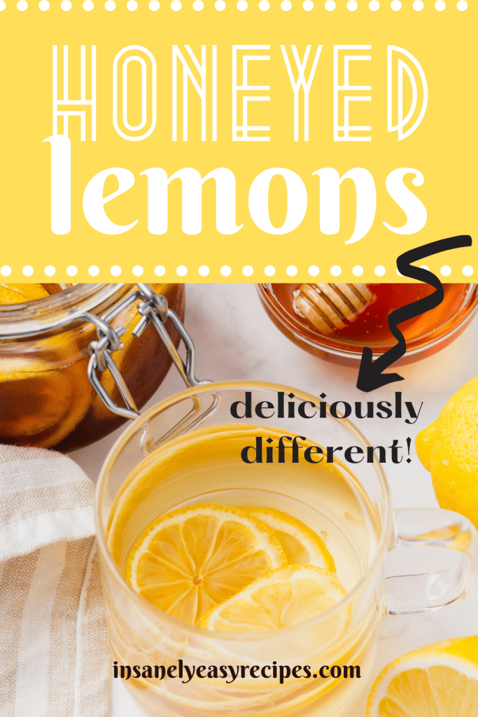 clear tea cup with clear water and lemon slices. Also visible is a honey jar with scooper and halved lemons with text overlay honeyed lemons