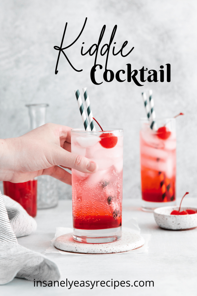 Kiddie Cocktail Drinks - two tall clear glasses with red and clear fizzy liquid with cherry and straws in the glass with text overlay: Kiddie Cocktail