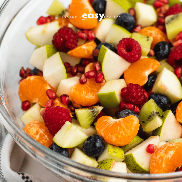 clear glass bowl of christmas fruit salad