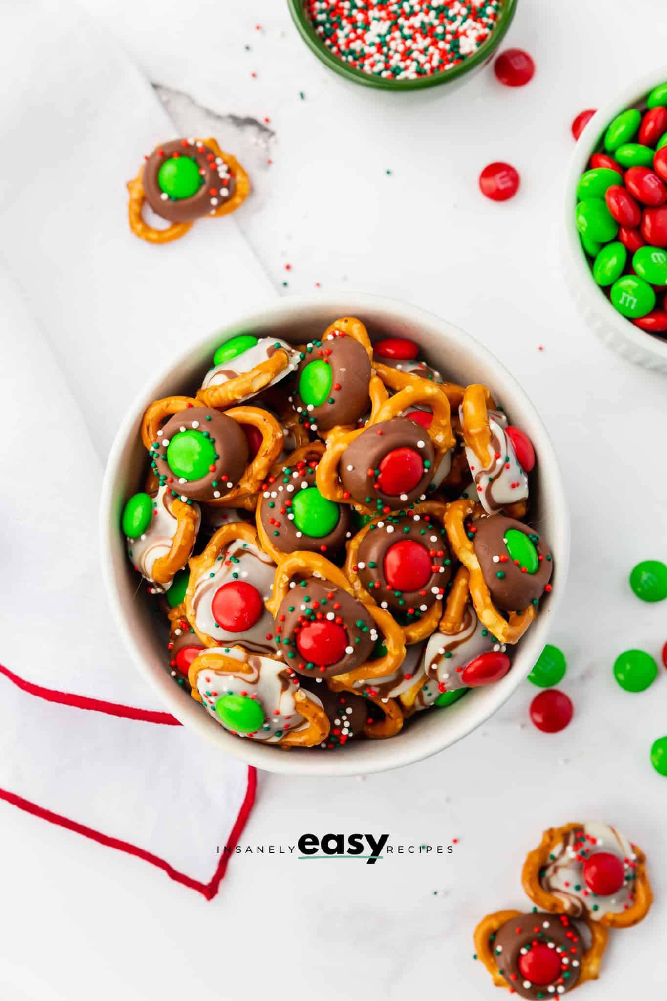 Overhead view of a bowl of chocolate christmas pretzels.