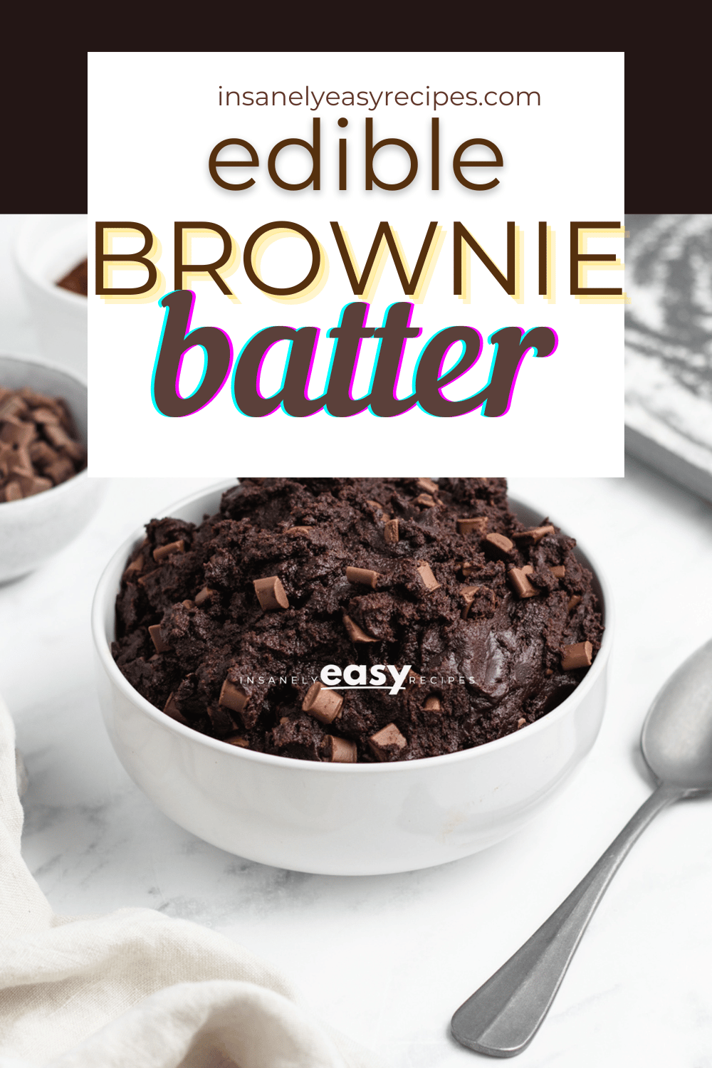 pinterest photo of edible brownie batter in a white bowl with a silver spoon next to it