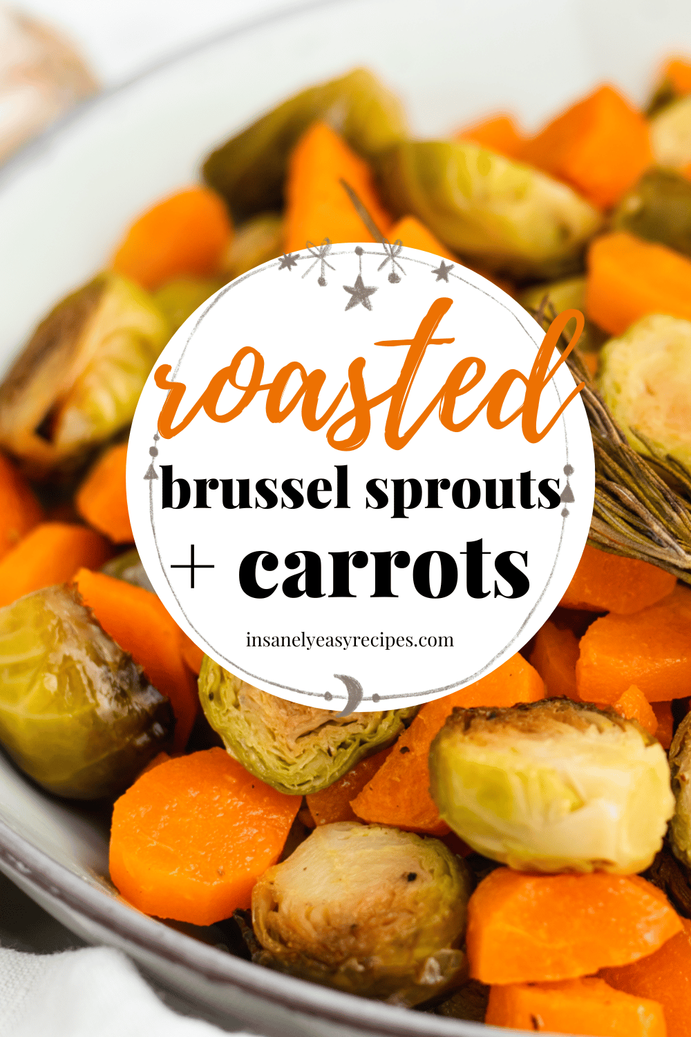 roasted brussel sprouts and carrots up close shot with text overlay roasted brussels and carrots