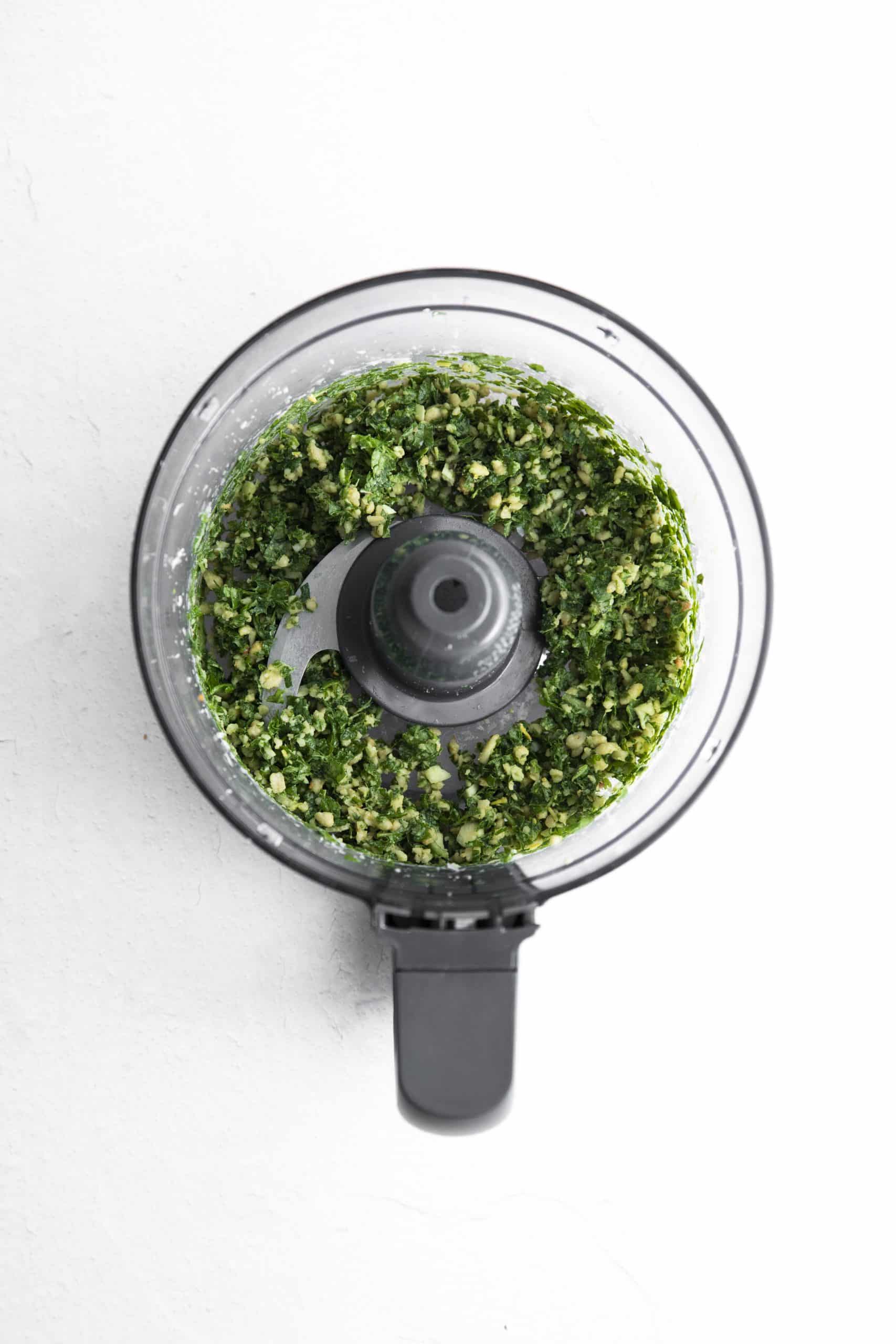 basil pesto in a food processor, before oil is added