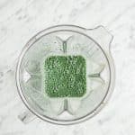 Topview photo of Spirulina Smoothie in a blender, mixed together.