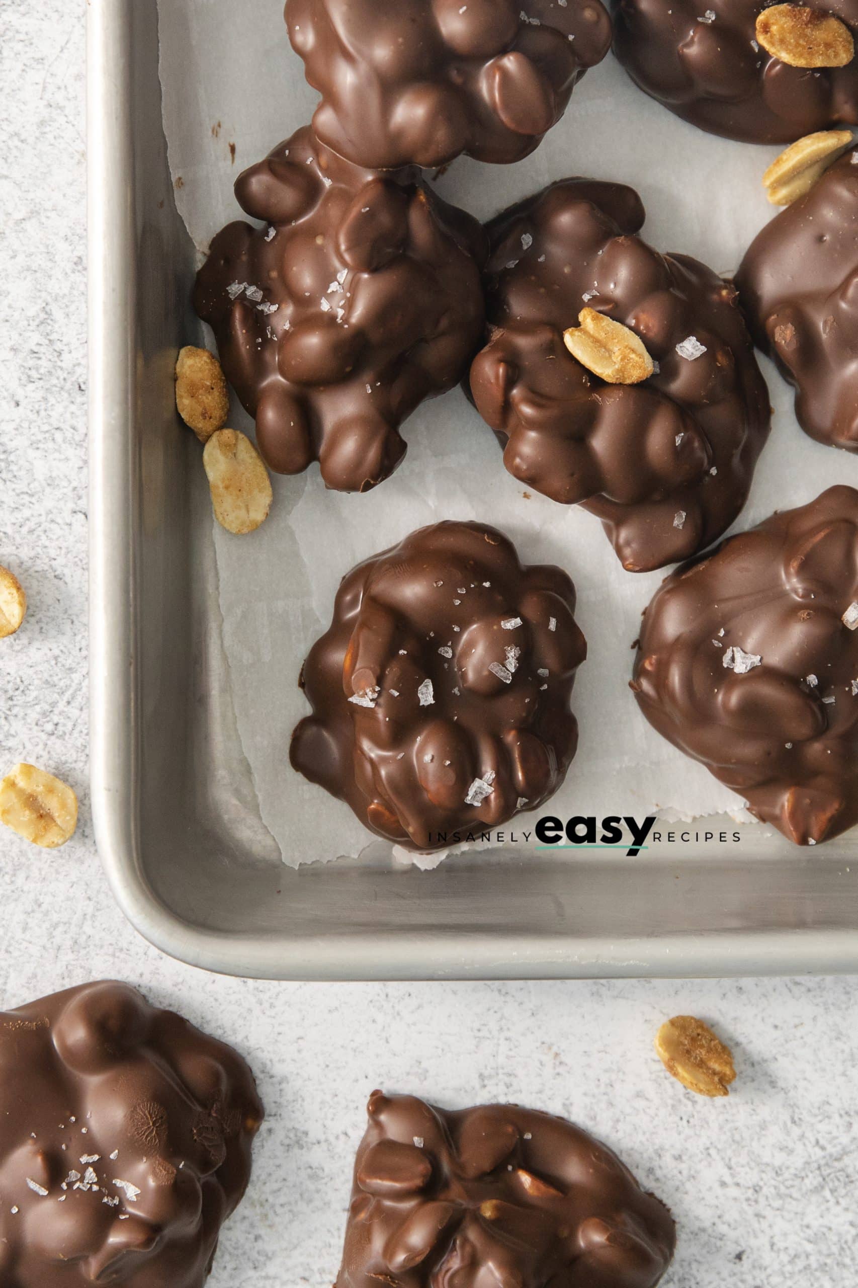 peanut candy clusters on a tray.