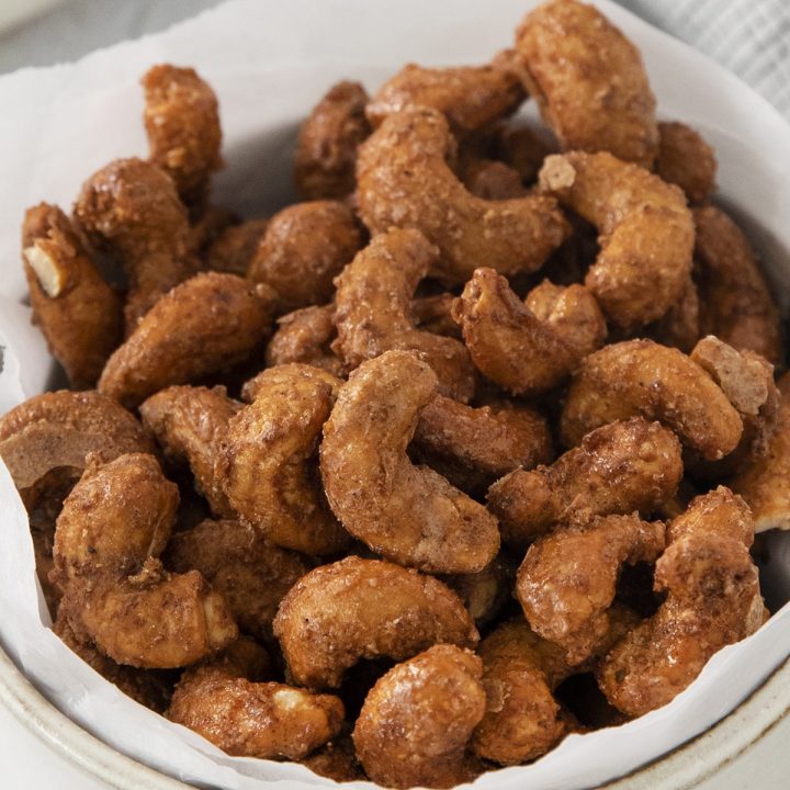 closeup view of baked homemade candied whole cashews