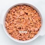 Photo of canned jackfruit that has been shredded, in a shallow white backing dip.